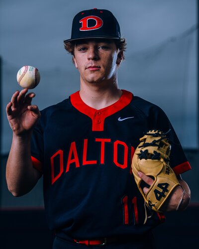 Baseball Player holding ball