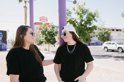 Two friends chatting outside.