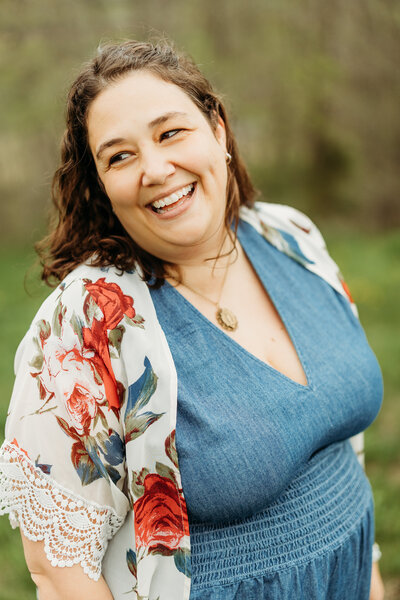 woman in denim dress with sheer cover up