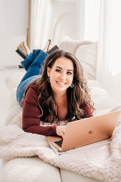 woman holding coffee in office