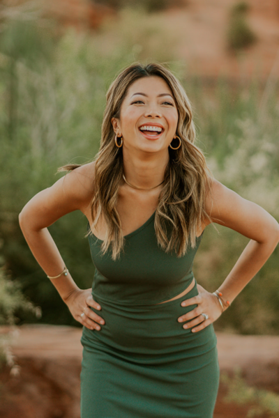 Julie Tran is a highly experienced women centered marriage coach who uses compassion as her focus tool. In this image Julie Tran radiates peacefulness