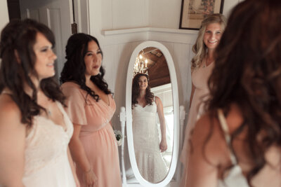 bride posing in mirror