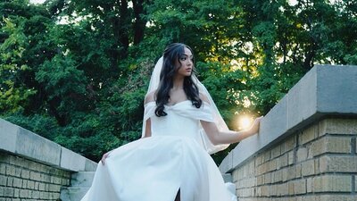 Bride walking downstairs at Laurel Hall in Indianapolis to her wedding ceremony.