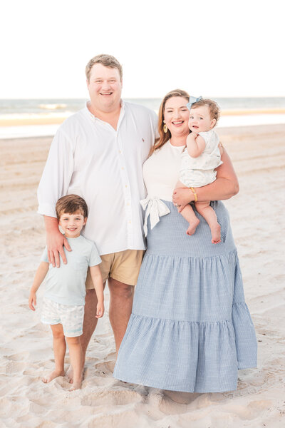 Mother holding baby during in-home lifestyle family session in Orlando Florida