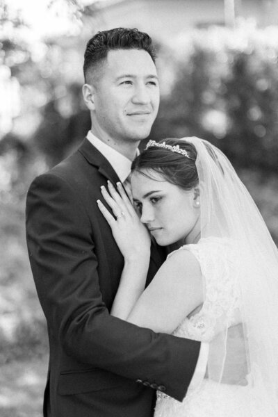 Bride-Resting-On-Grooms-Chest