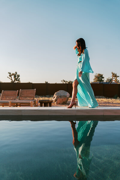 women walking by pool of luxury  vacation rental