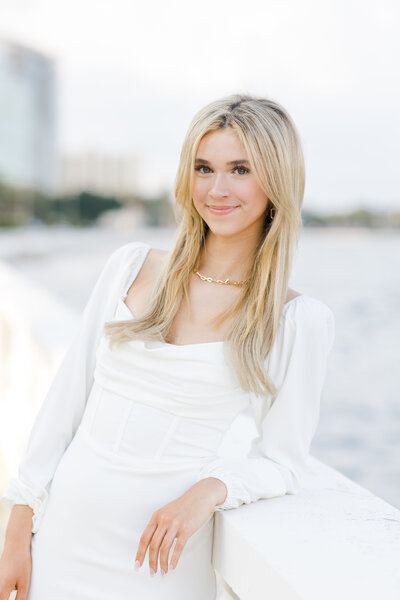 Senior girl white dress on bayshore boulevard in tampa. Tampa florida senior photographer. 