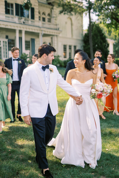 Wedding party walking at Glen Foerd Estate in Philadelphia, PA