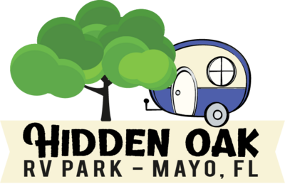 Logo of Hidden Oak RV Park, Mayo, FL. Features a cartoon tree and a retro RV trailer in blue and cream. The text "Hidden Oak RV Park – Mayo, FL" is below the images, showcasing a haven for Mayo Florida camping enthusiasts seeking monthly campground rates in Florida.