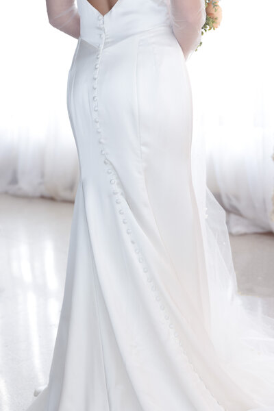 bride wearing white wedding gown