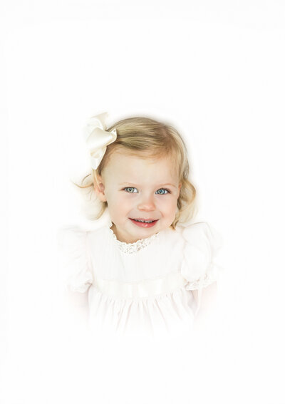 Color Heirloom Portrait of Litlte Girl with a bow in her hair