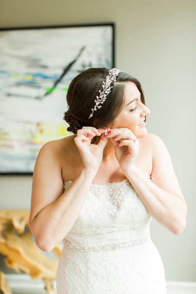 White textured wedding bouquet with greenery crafted by Bouquet Studio and photographed by Loren Jackson Photography at Gervasi Vineyard in Canton Ohio