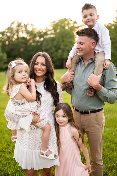 A family outdoor during a portrait shoot