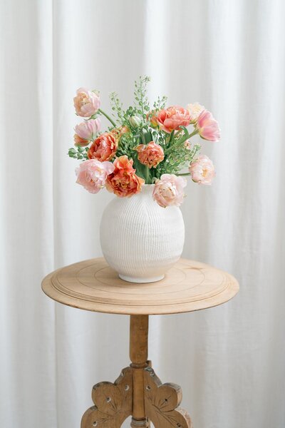 product photography for small business with floral arrangement sitting on a table captured by brand photographer