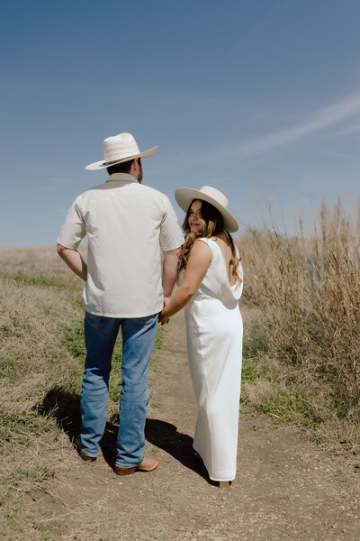Photos by Tia is a wedding, elopement, engagement, and creative session photographer based in Austin, Texas. She offers both digital and film photography services.