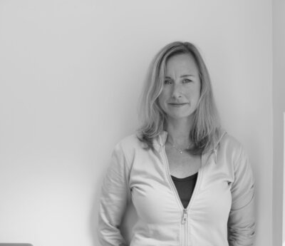 headshot of a woman who is a Pilates Mentors advisor 