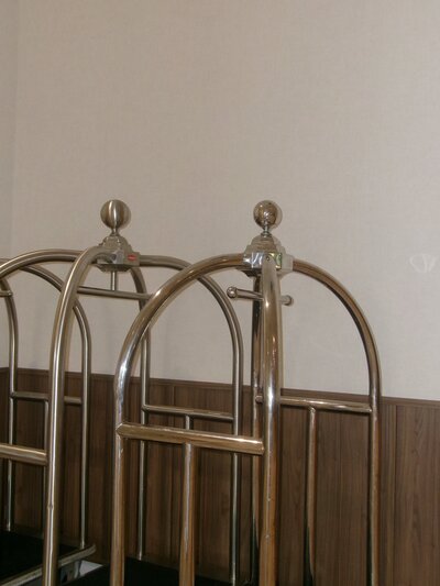 Jace Tarbell and traveler aboard a luxury catamaran with mountain views, showcasing curated experiences for discerning travelers.