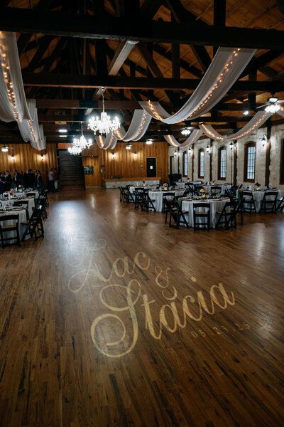Reception hall with draped ceiling and custom light projection