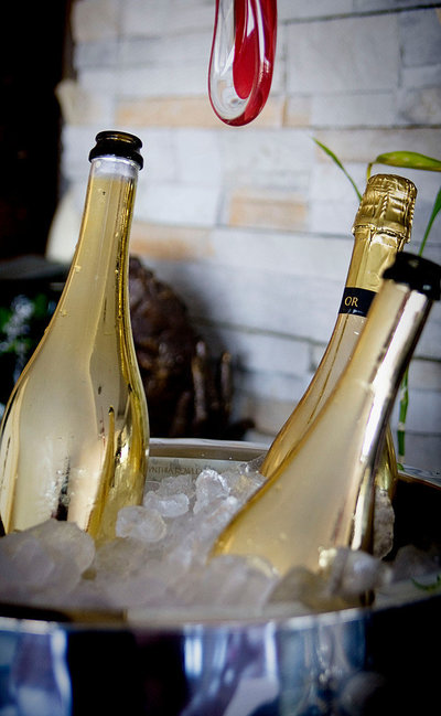 Bottles of champagne in bucket of ice