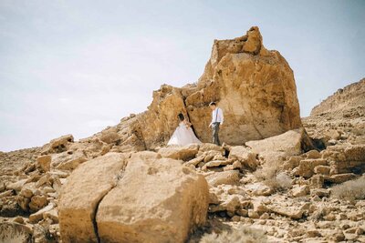 married-couple-walking-rocks