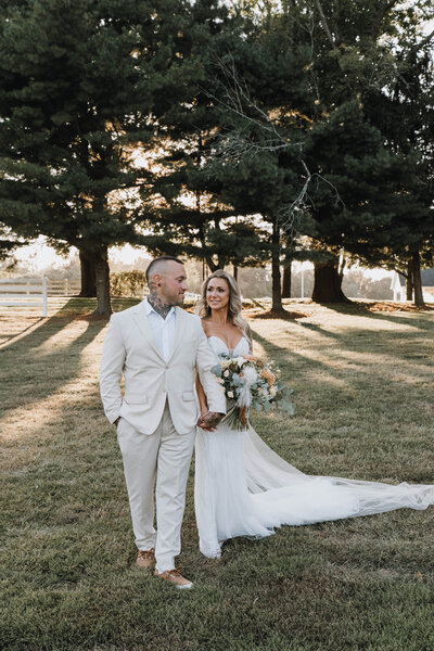 Wedding couple photographed at golden hour in Colts Neck, NJ — planned by Well-Dressed Events