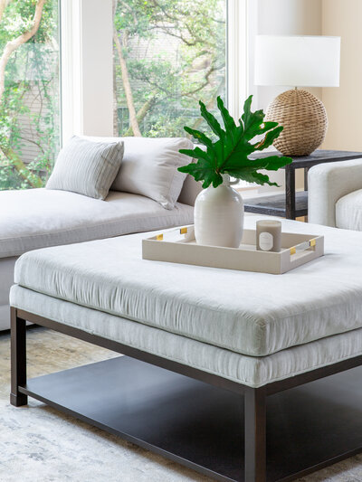 Serene living space in Kiawah Island, SC, with neutral tones, modern furnishings, and natural light.