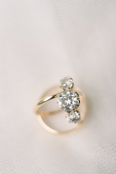 Beautiful three stone old mine cut diamond engagement ring from Andria Barboné Jewelry for lake placid bride
