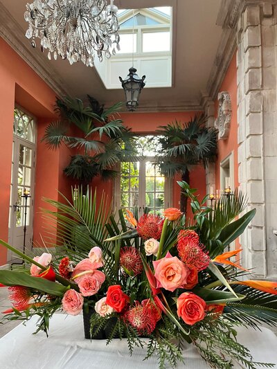 luxury peach floral display with proteas