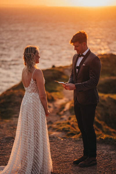 couple elope in golden light