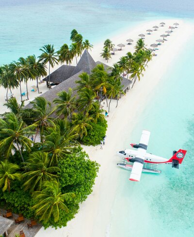 Sea plane docked at a private island
