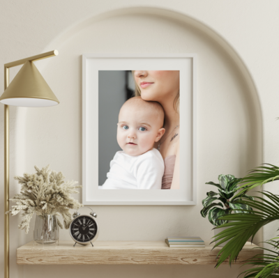 photographer print from a baby session hanging on the wall in baltimore md
