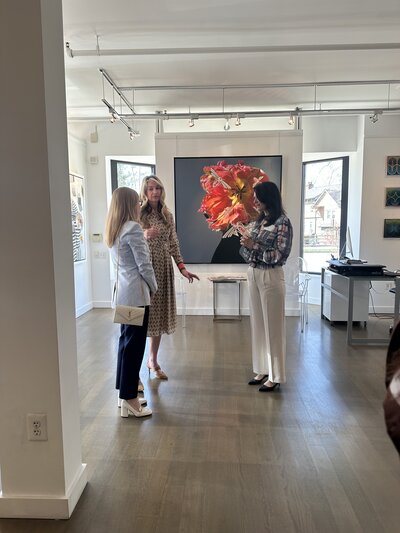 Liz Walton talking to friend at event