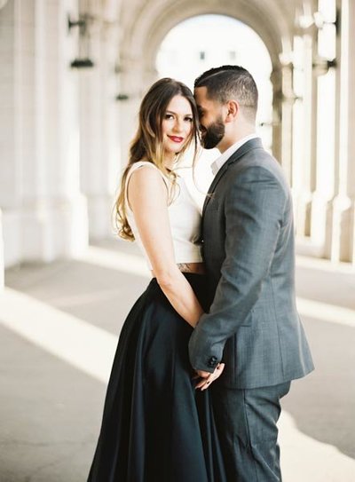 Formal Washington DC Engagement Photos at Union Station with Statement Black Skirt and Crop Top © Bonnie Sen Photography