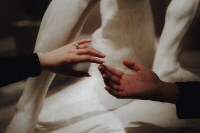 Two hands barely touching each other