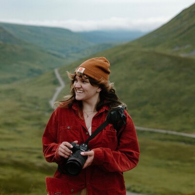photographer overlooks mountain range