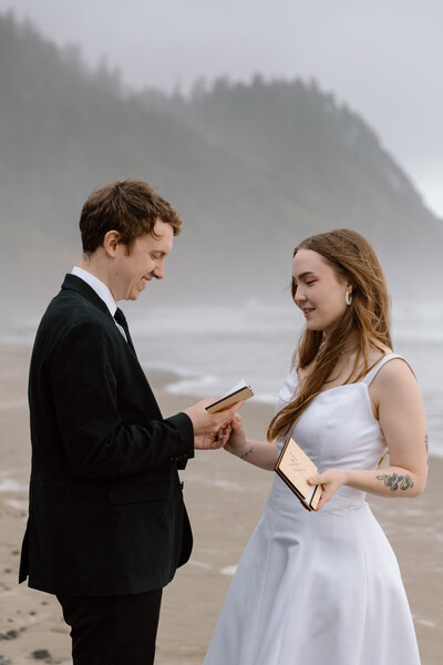 Groom reading his vows on the Oregon Coast.