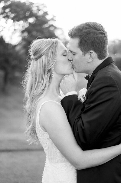 bride and groom kissing