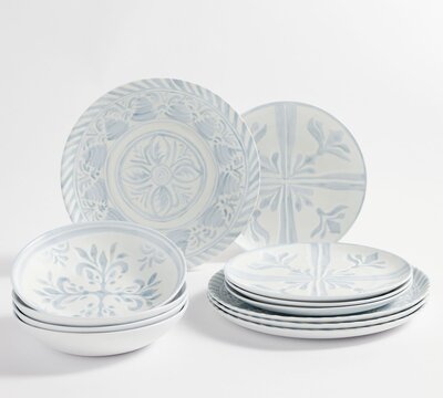 White melamine dish set with light blue tile motif. 