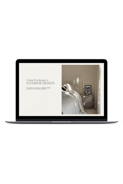 Laptop displaying the front cover of ‘Colour Psychology in Interior Design,’ an insightful guide offered as a free resource.