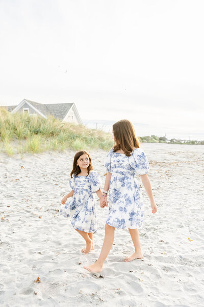 Mom and son walking the beach