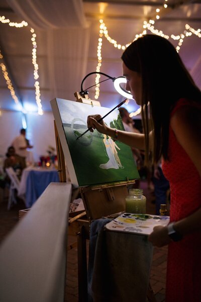 Live watercolor guest portrait of a newlywed couple