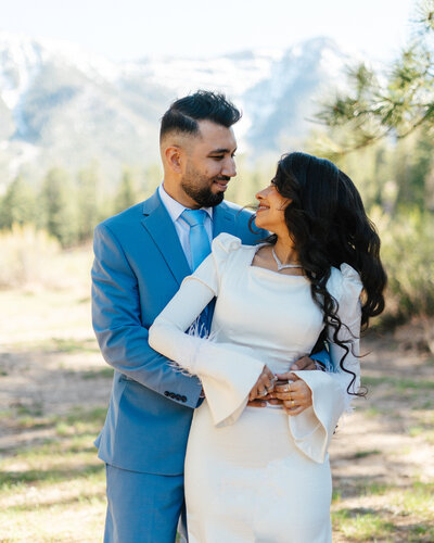 couple stares into each others eyes during an engagement session at mount charleston just. outside of Las Vegas, NV