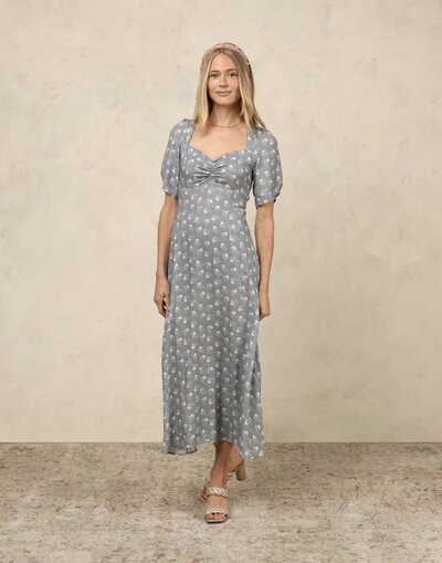 Violet Dress has above elbow sleeves, and a gathering at the front bodice. Perfect for your special occasions.