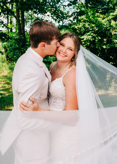 Newlywed couple embracing after getting married