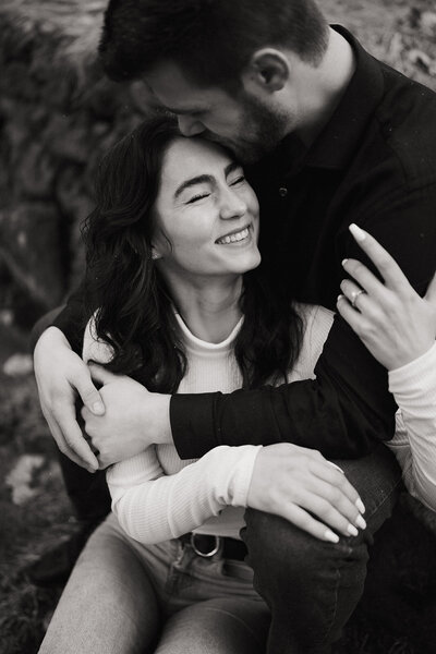black and white photo of couple hugging