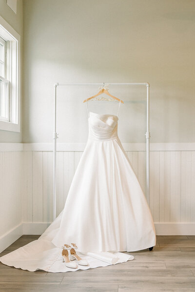 Wedding dress ballgown hanging up