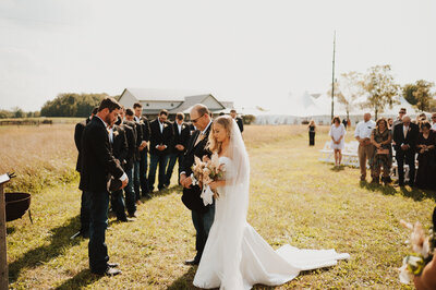 couple walking down the aisle