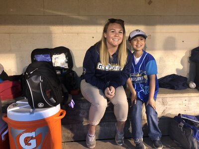 emily arranging centerpieces at a west michigan wedding