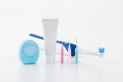 Toothpaste, floss, interdental brushes and electric toothbrush