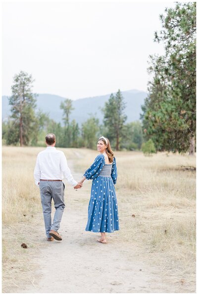 Missoula engagement photos of couple nose to nose standing in the snow